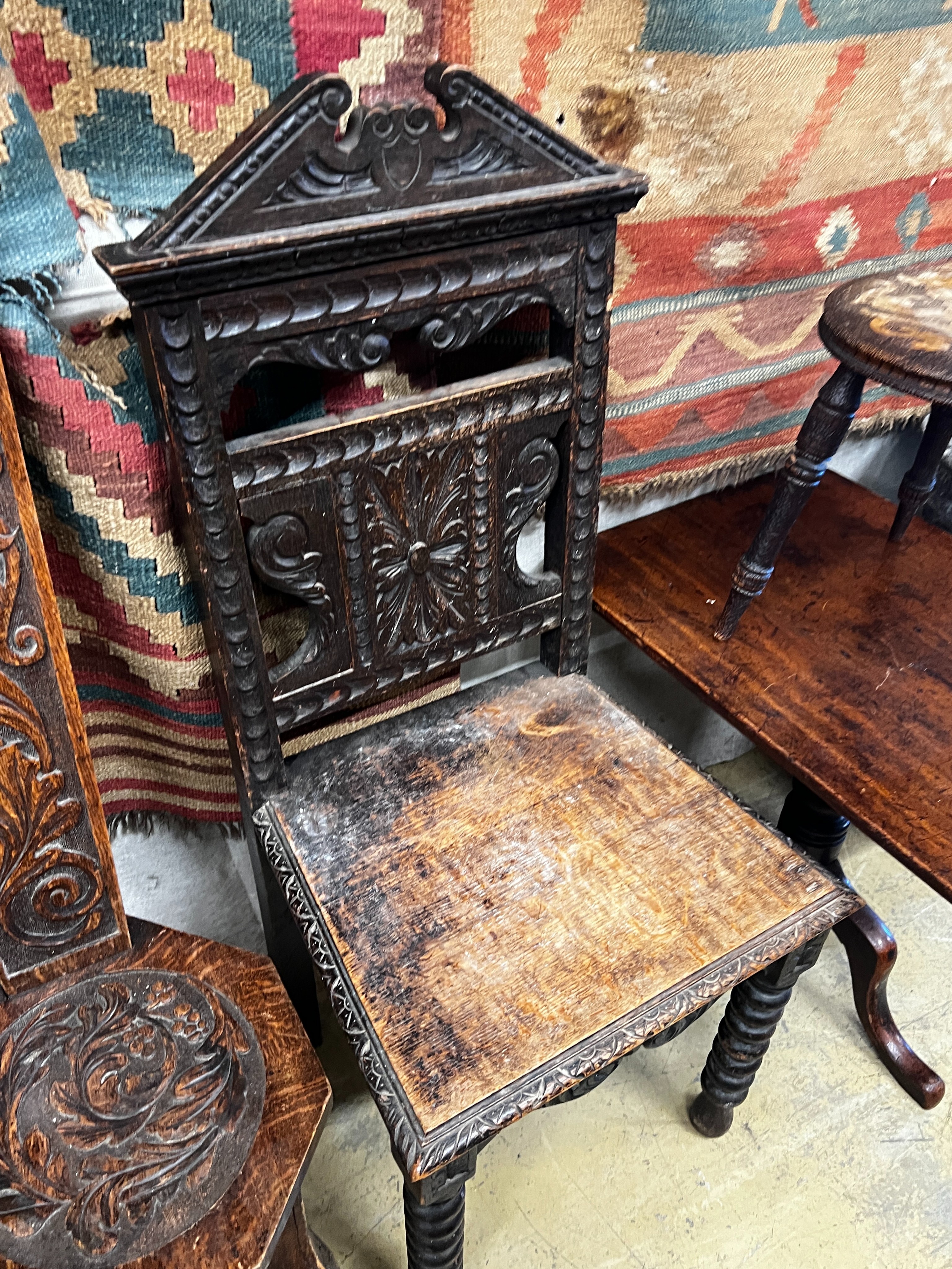 A Victorian oak hall chair table, spinning chair, a pokerwork stool and a wine table